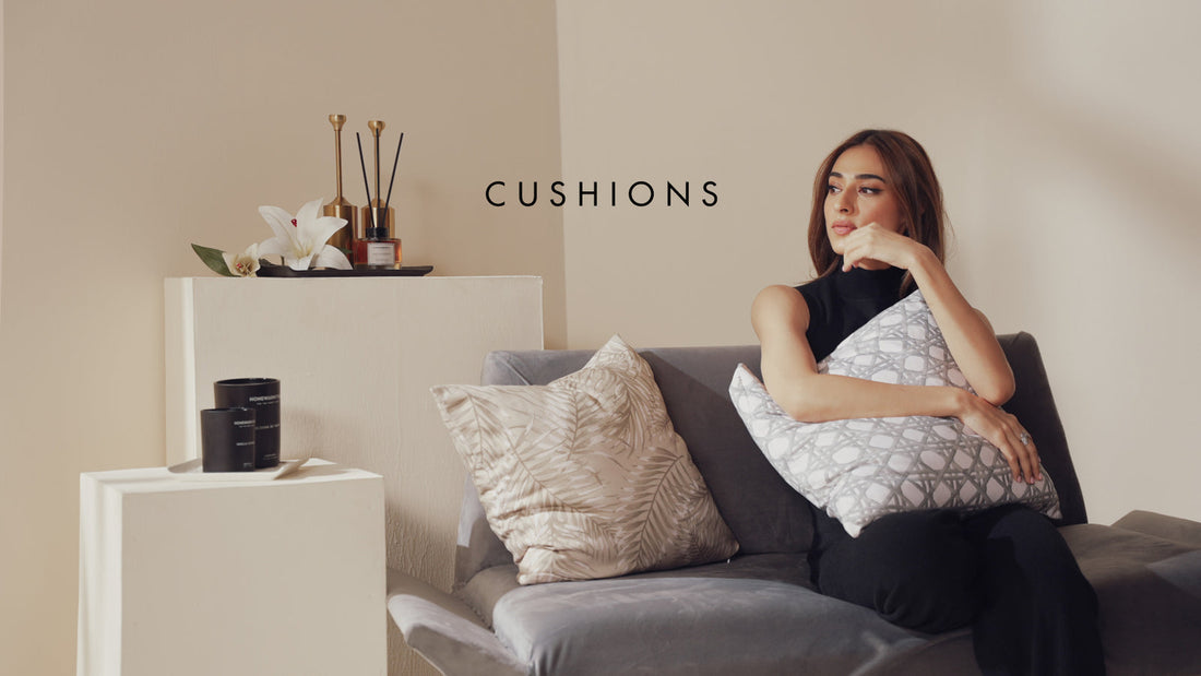 Cozy autumn bedroom with soft cotton bed linen, eco-friendly sheets, a fall room spray bottle on a wooden table, lit candle glowing warmly, scattered autumn leaves and pumpkins, soft natural lighting, calming aromatherapy vibe, high-quality lifestyle