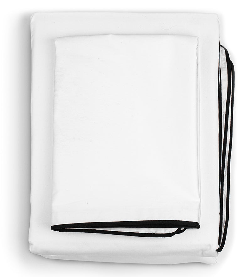 White inflatable pool with black handle on a white background