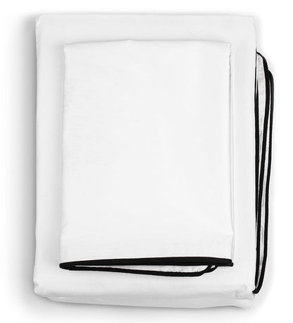 White inflatable pool with black handle on a white background