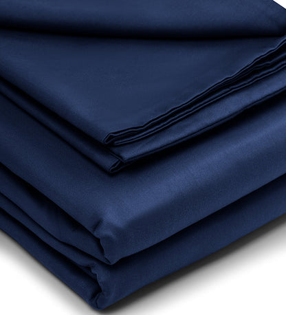 Folded navy blue fabric on a white background