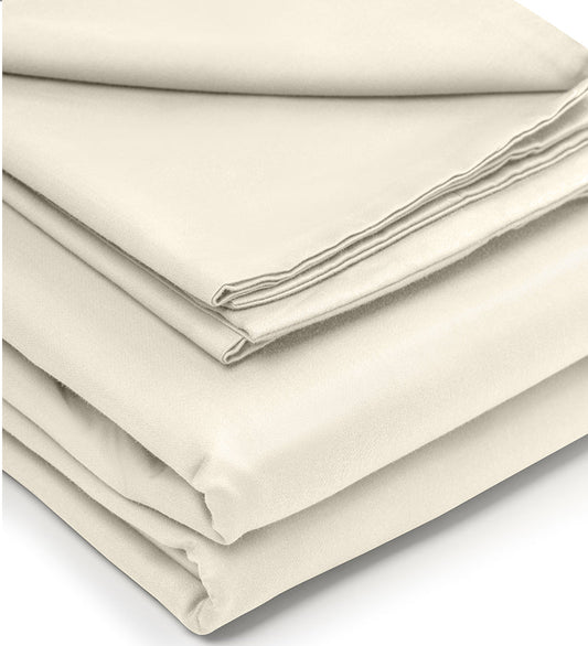 Stack of beige bed sheets on a white background
