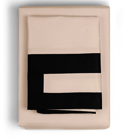 Folded beige blanket with black stripes on a white background