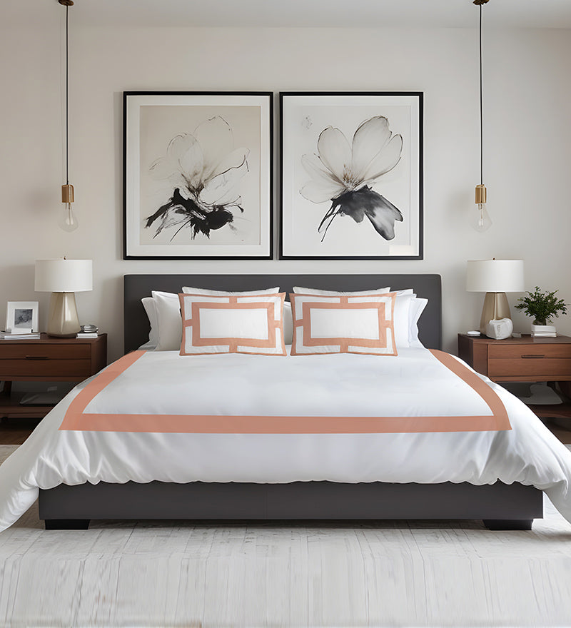 Modern bedroom with a bed, nightstands, and wall art.