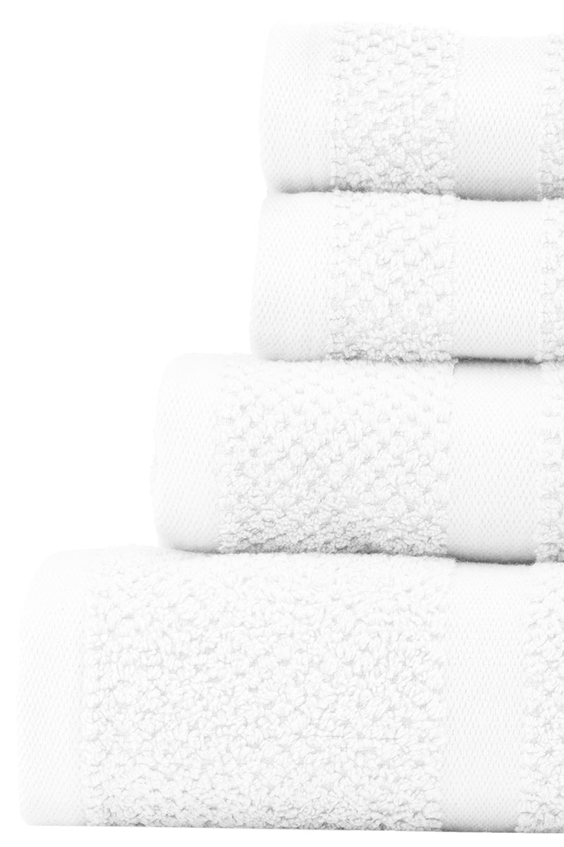 Stack of white towels on a white background