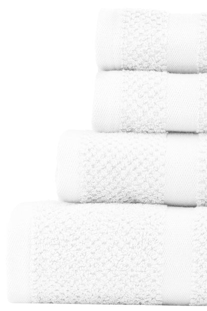 Stack of white towels on a white background