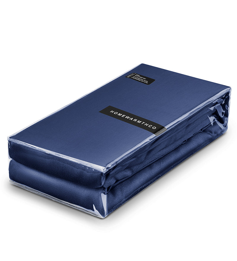 Blue mattress cover with 'Home Warmth' label on a white background