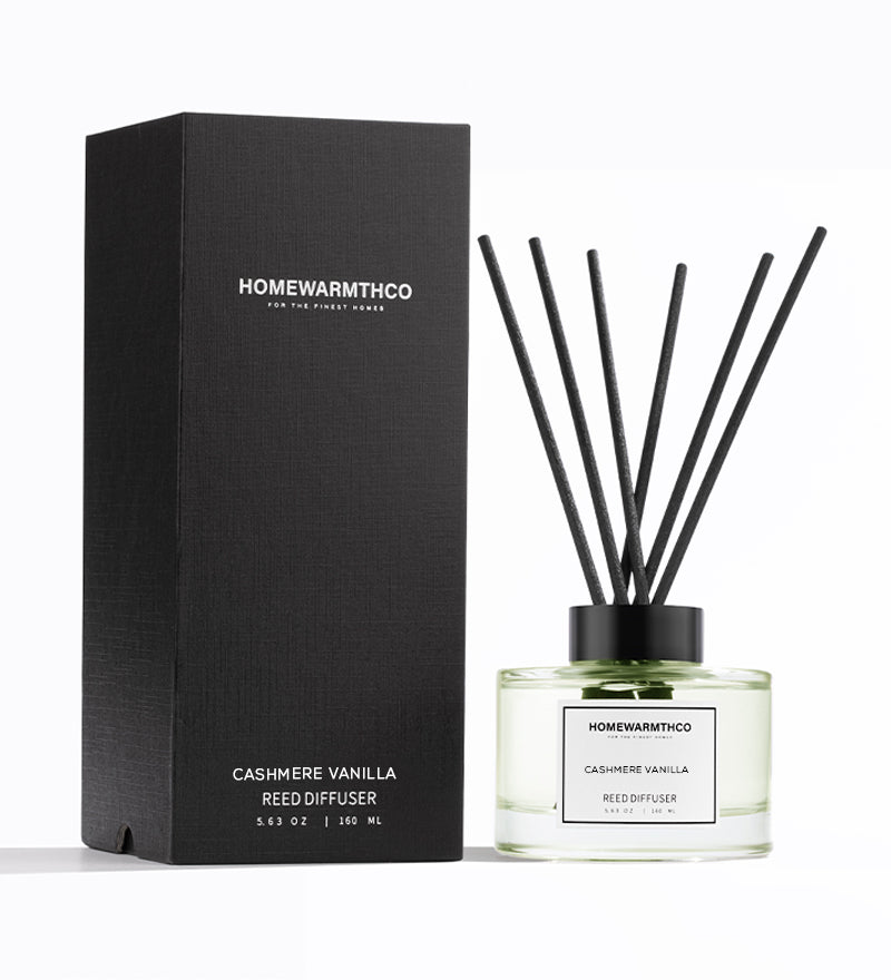 Homewarmthco Cashmere Vanilla Reed Diffuser with packaging on a white background