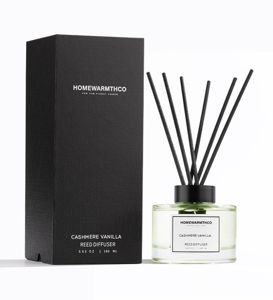 Homewarmthco Cashmere Vanilla Reed Diffuser with packaging on a white background