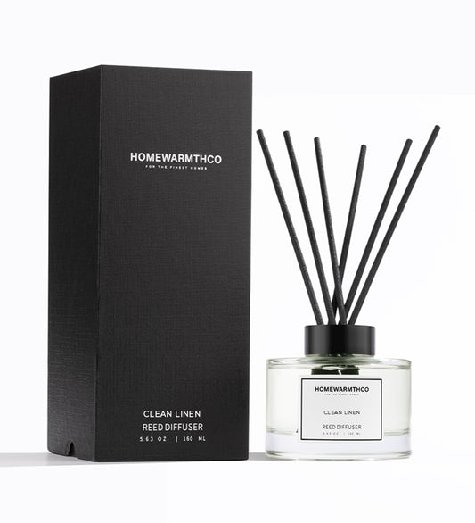 Homewarmthco Clean Linen Reed Diffuser with packaging on a white background