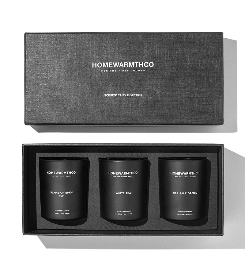 Homewarmthco scented candle gift set with three candles in a box.