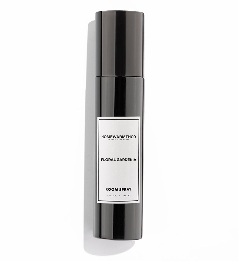 Room spray bottle with 'Homewarmthco' label on a white background