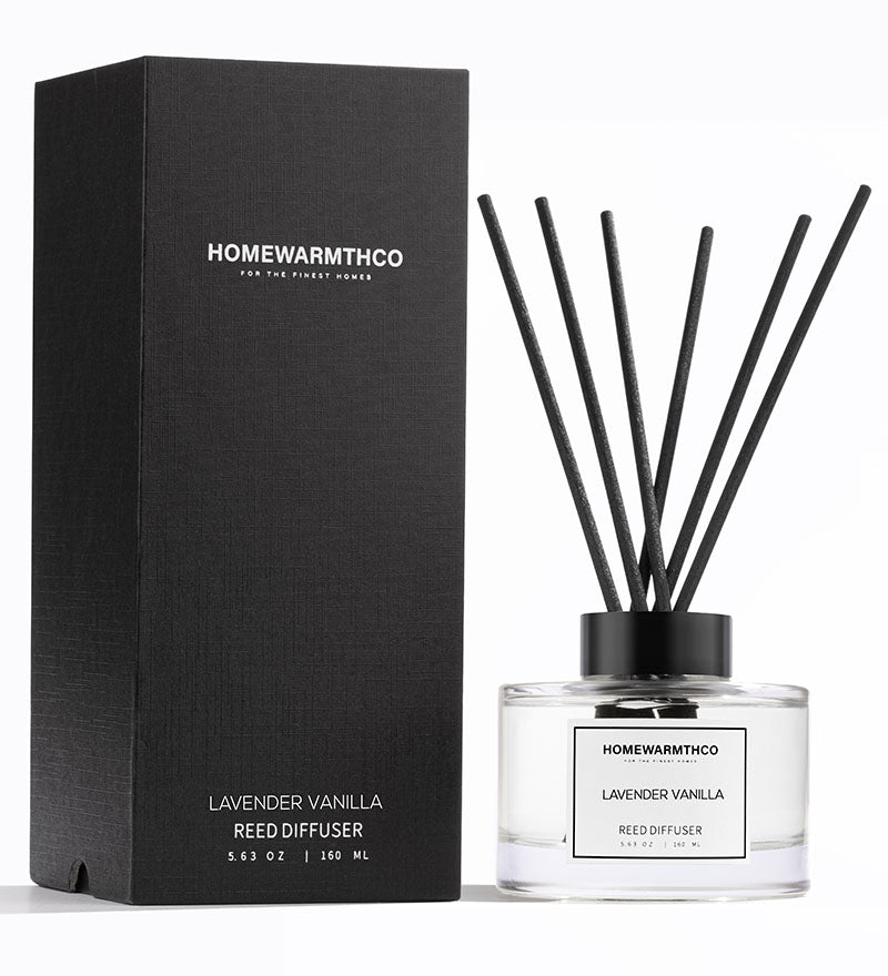 Homewarmthco lavender vanilla reed diffuser with packaging on a white background