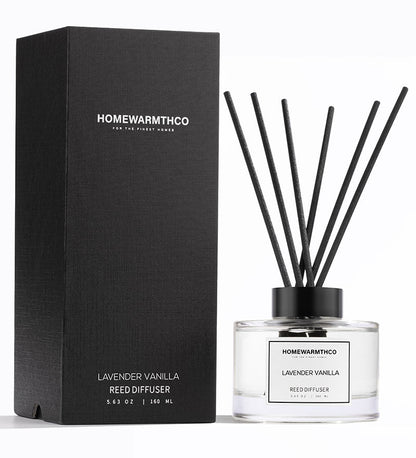 Homewarmthco lavender vanilla reed diffuser with packaging on a white background