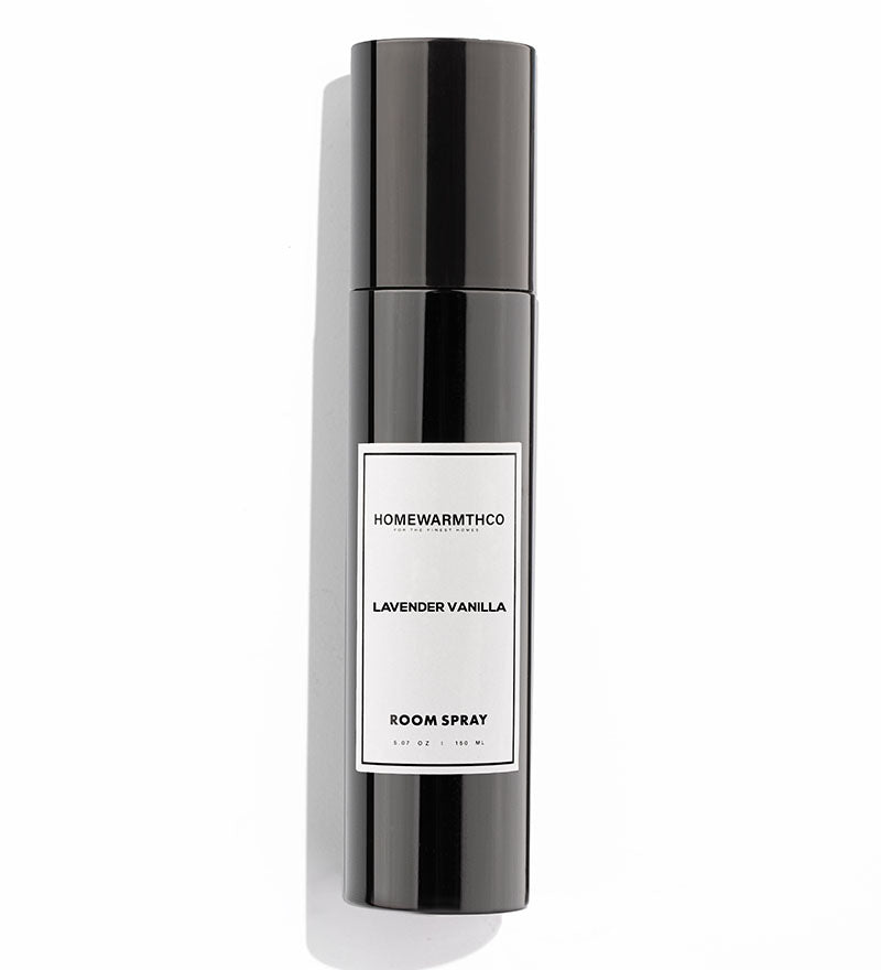 Room spray bottle with 'Homewarmthco' label on a white background