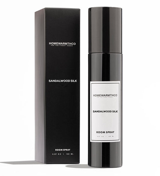 Homewarmthco Sandalwood Silk room spray bottle and packaging on a white background