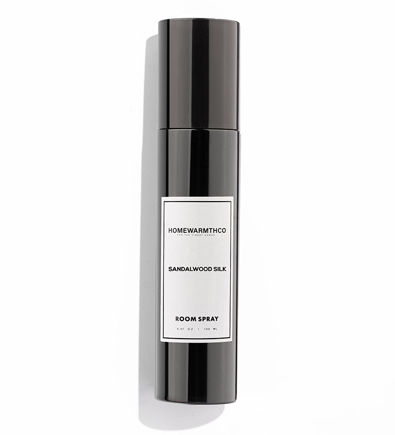 SANDALWOOD room spray bottle with 'Homewarmthco' label on a white background