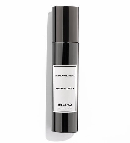 SANDALWOOD room spray bottle with 'Homewarmthco' label on a white background