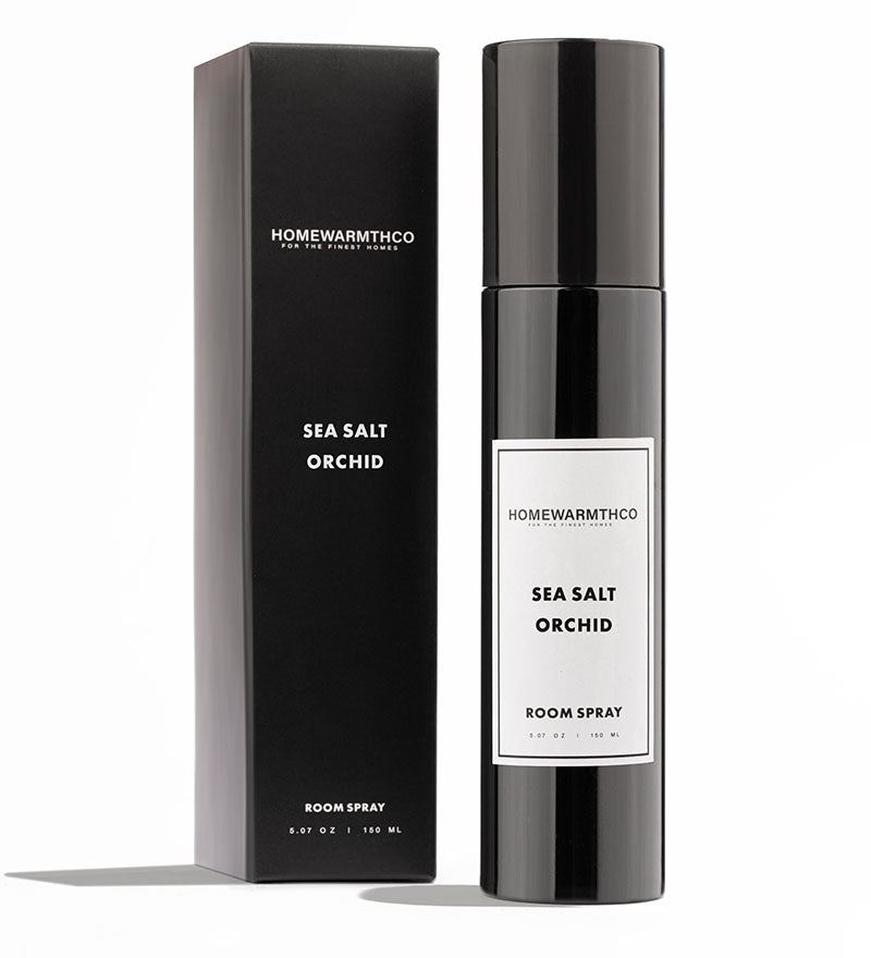 Homewarmthco Sea Salt Orchid room spray and packaging on a white background