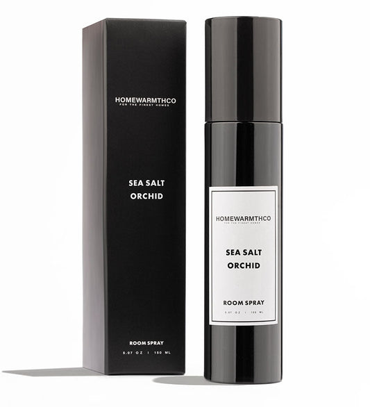 Homewarmthco Sea Salt Orchid room spray and packaging on a white background