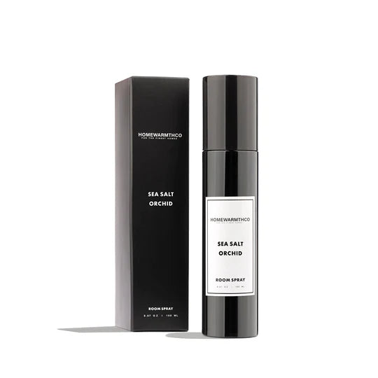 Homewarmthco sea salt orchid room spray bottle and packaging on a white background
