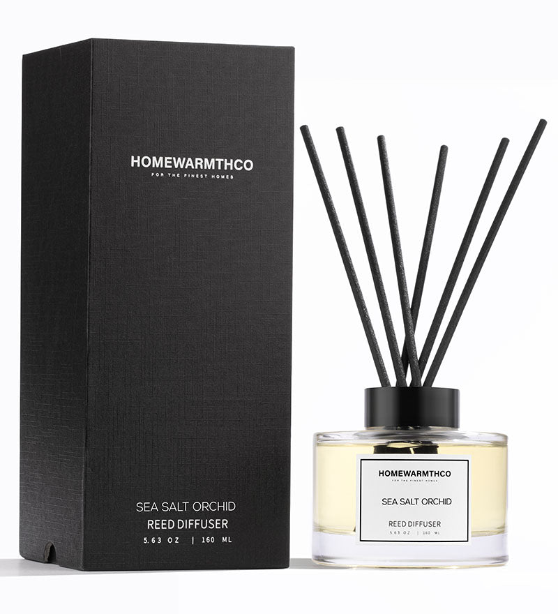 Homewarmthco Sea Salt Orchid reed diffuser with packaging on a white background