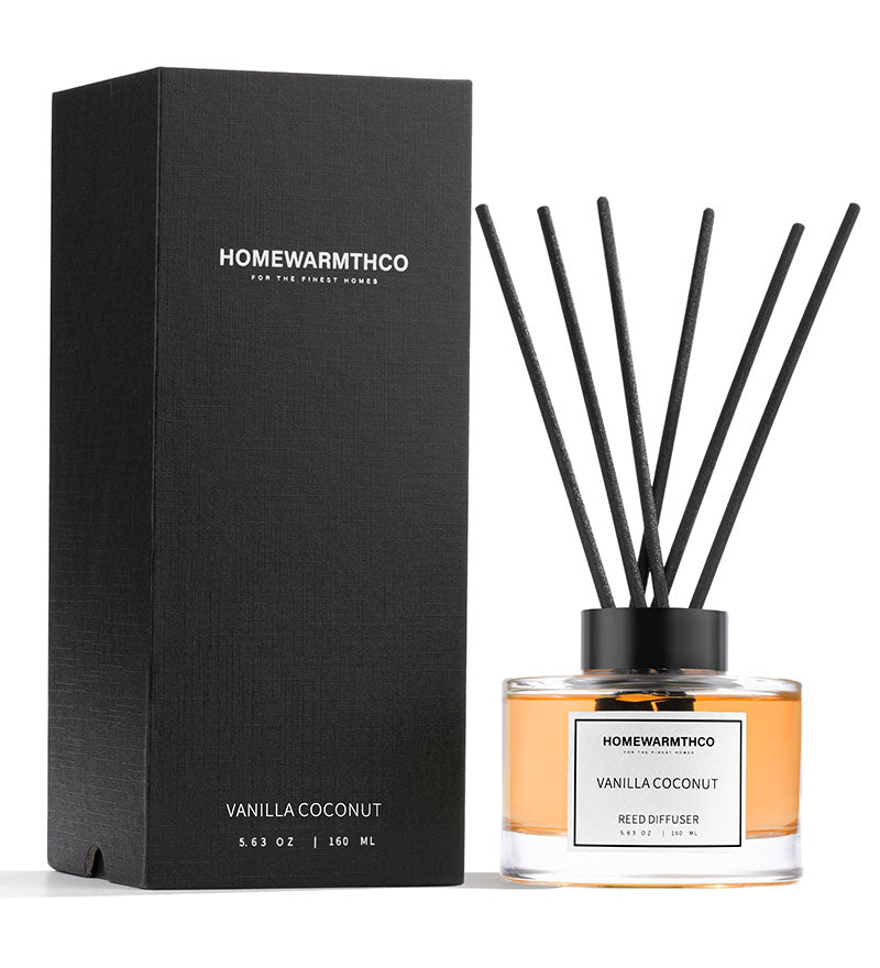 Homewarmthco Vanilla Coconut reed diffuser with packaging on a white background