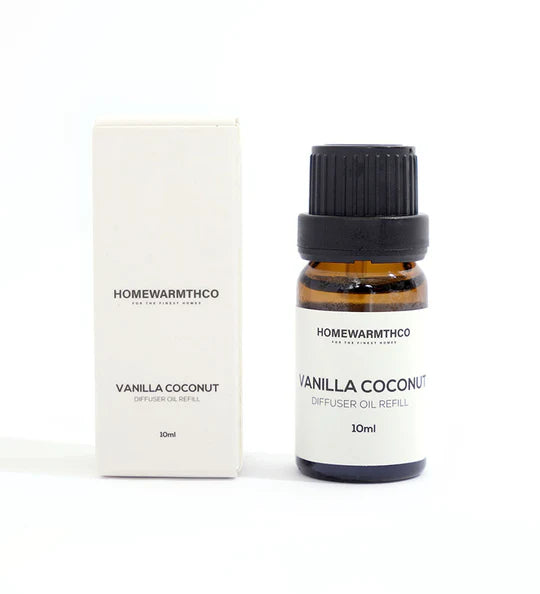Homewarmthco Vanilla Coconut electric diffuser essential  oil refill bottle and packaging on a white background