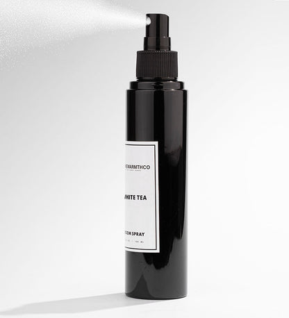 Whitetea Black spray bottle with a label on a white background