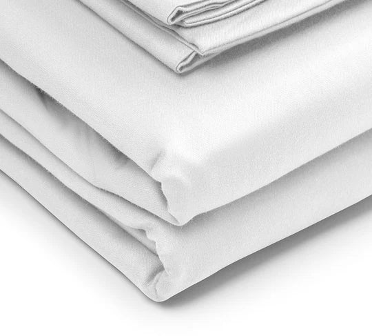 Stack of white satin sheets on a light gray background