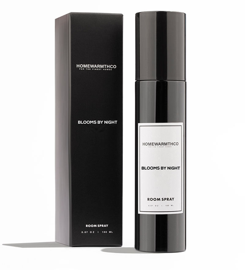 Homewarmthco room spray bottle and packaging on a white background
