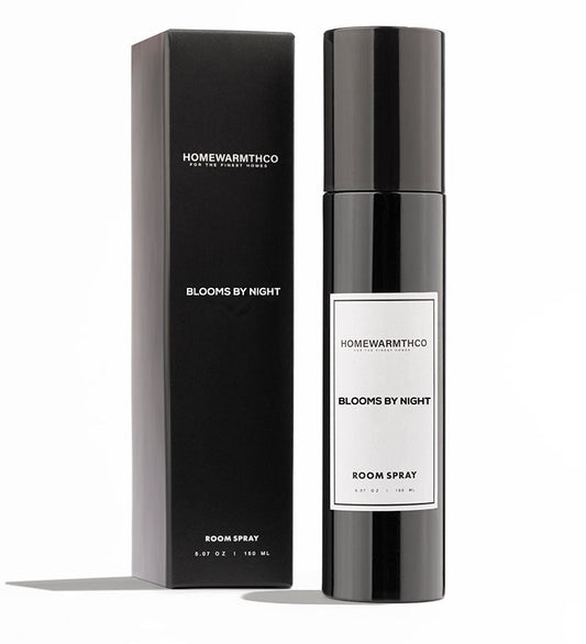 Homewarmthco room spray bottle and packaging on a white background