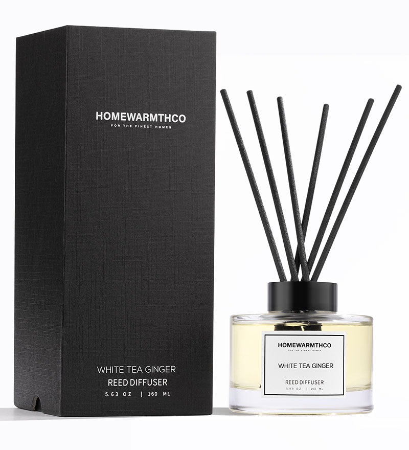 Homewarmthco White Tea Ginger reed diffuser with packaging on a white background