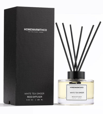 Homewarmthco White Tea Ginger reed diffuser with packaging on a white background