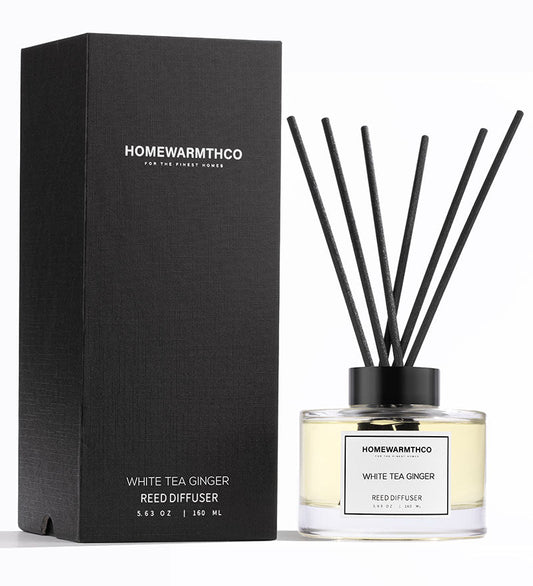 Homewarmthco White Tea Ginger reed diffuser with packaging on a white background